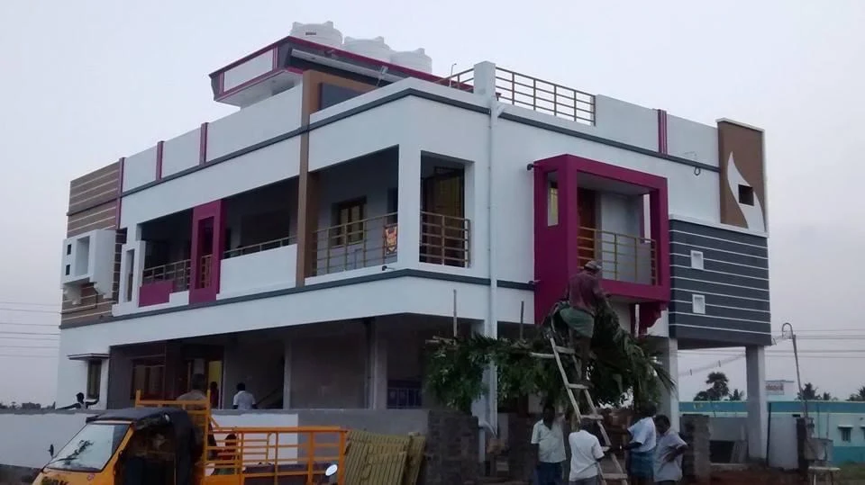 Newly completed two-storey house with magenta and grey accents